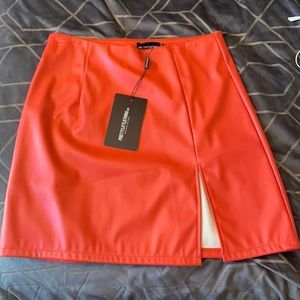 Red faux leather skirt